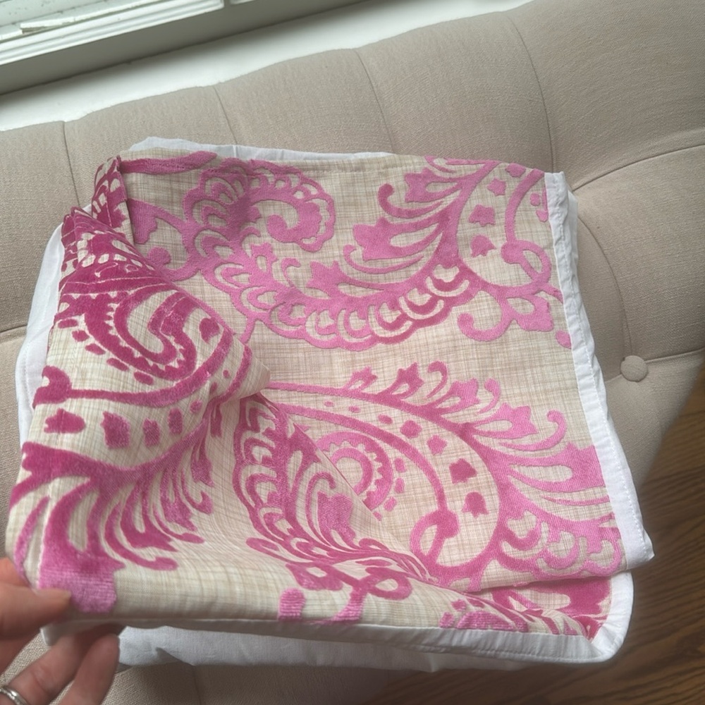 Custom crib skirt, pink velvet with a beige background
